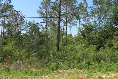 12006 Raccoon Road, Southport, FL 32409 - Photo 1