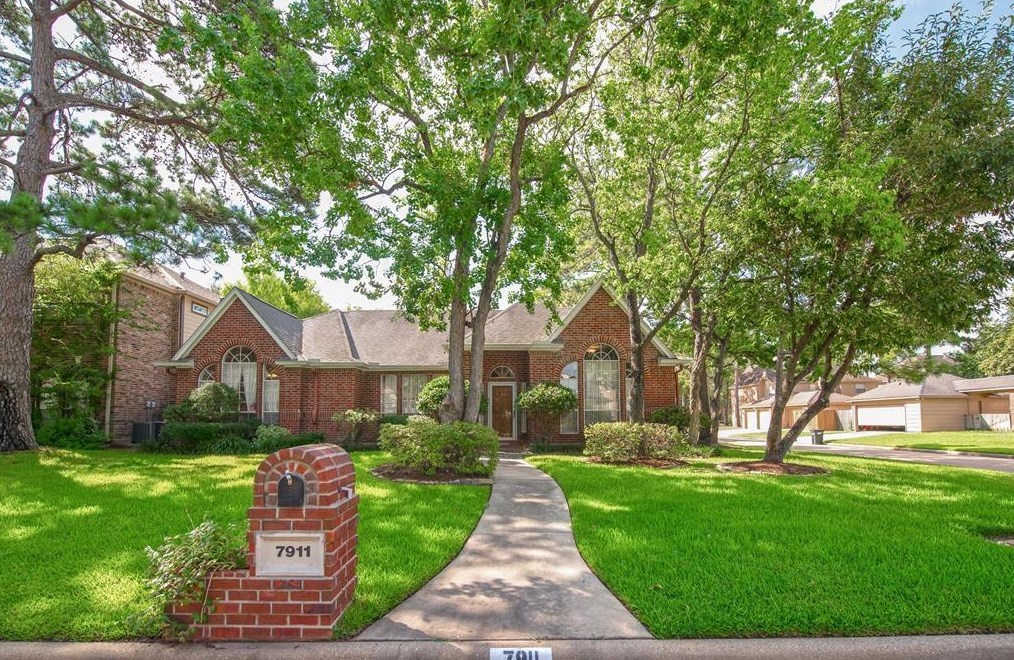 7911 Theiss Hill Dr, Spring, TX 77379