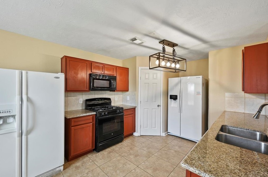 7915 Talladega Springs Ln, Richmond, TX 77407