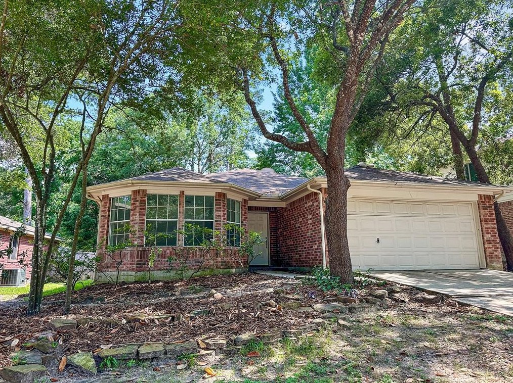 35 Windswept Oaks Pl, Conroe, TX 77385