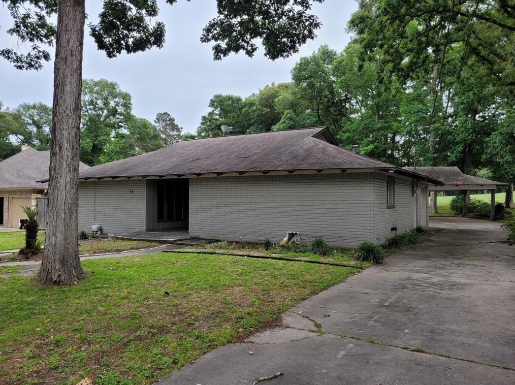 24 Greentree Ln, Conroe, TX 77304