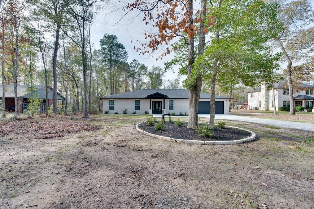 10622 Rustling Oaks Dr, Conroe, TX 77303