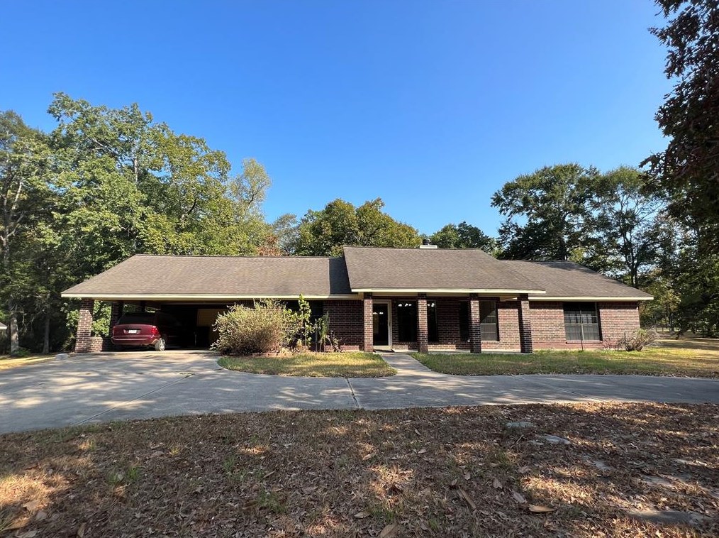 12345 Oak Leaf Rd, Conroe, TX 77303