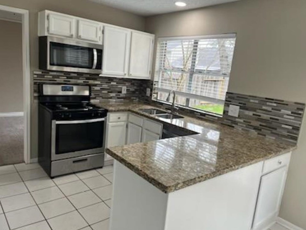 8831 Stoney Bend Dr, Spring, TX 77379-6361