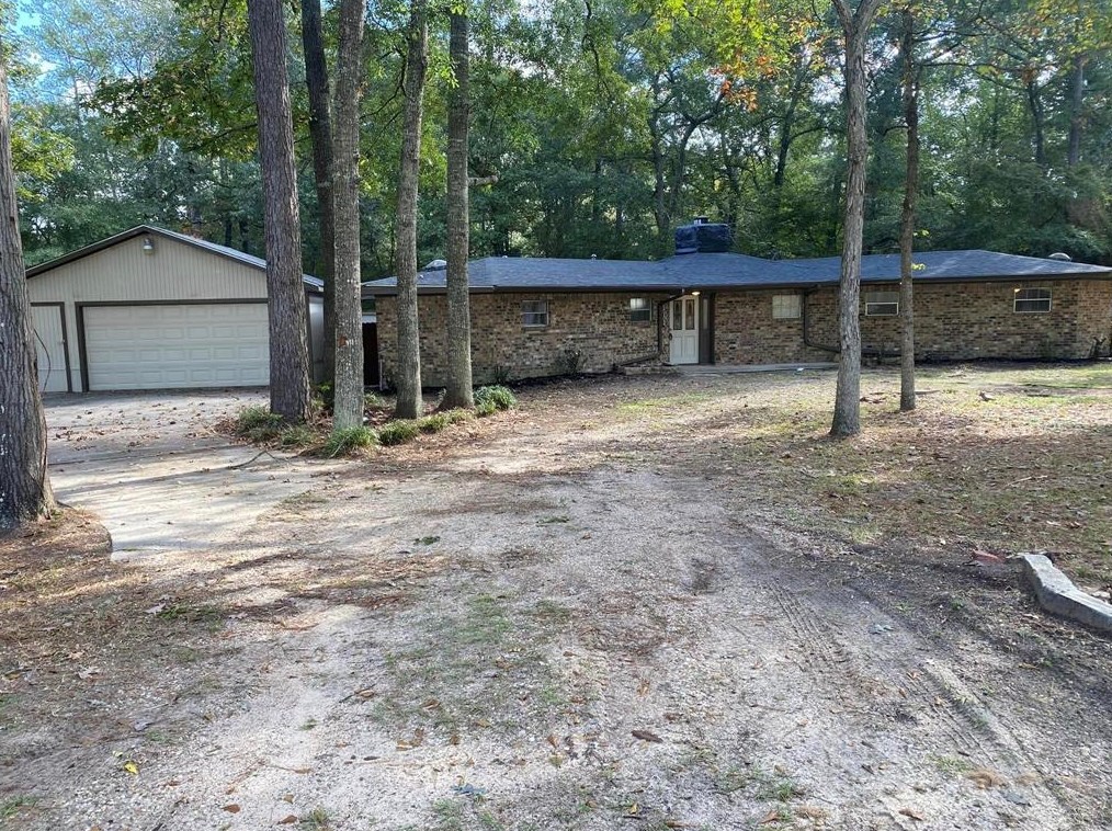 313 Red Bud Ln, Roman Forest, TX 77357-2822