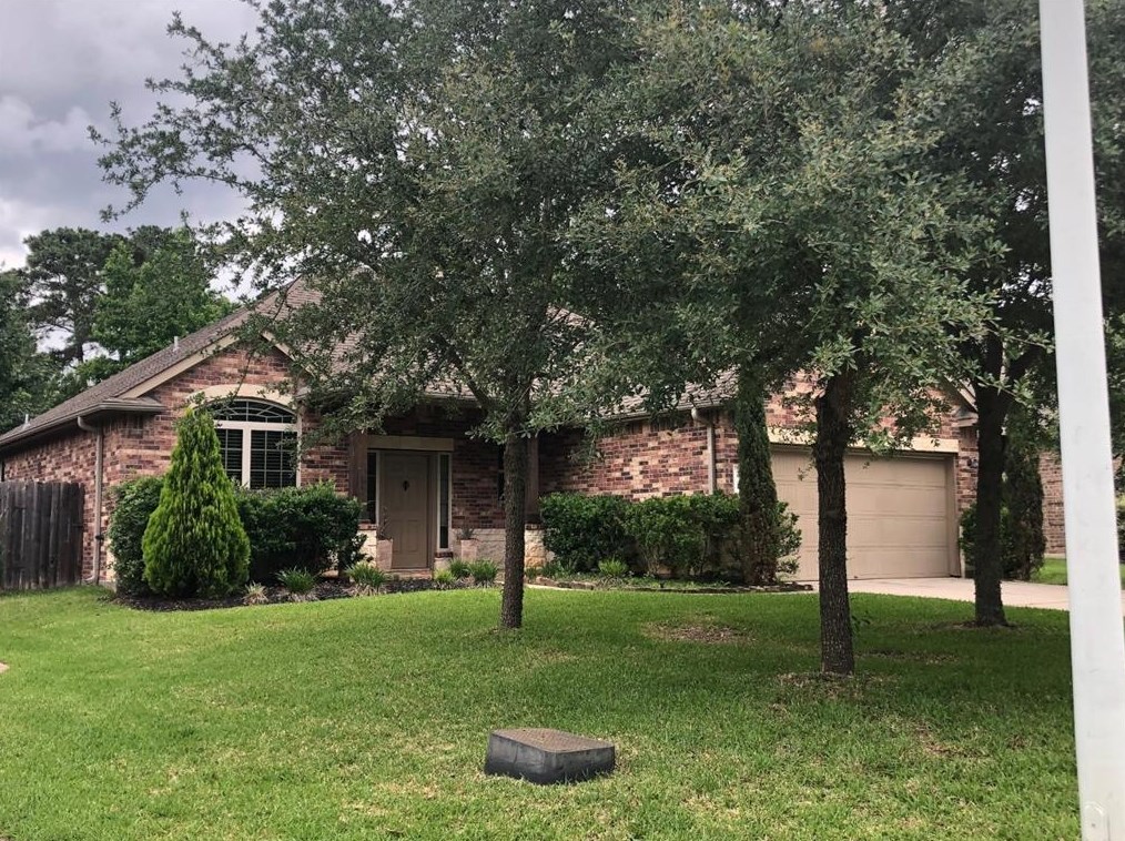 1946 Honey Laurel Dr, Conroe, TX 77304