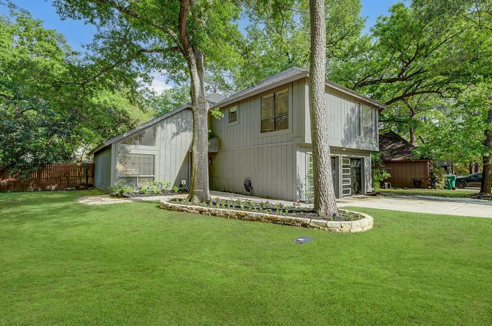 38 N Timber Top Dr, Spring, TX 77380