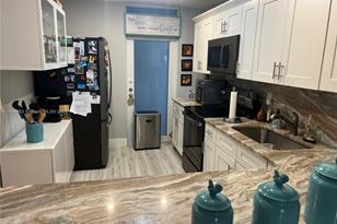 410 Golden Isles Dr, Hallandale Beach, FL 33009 - Photo 8