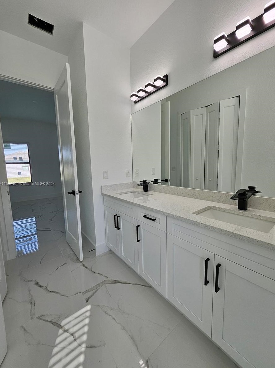 651 Keller St, Lehigh Acres FL 33974-7560 exterior