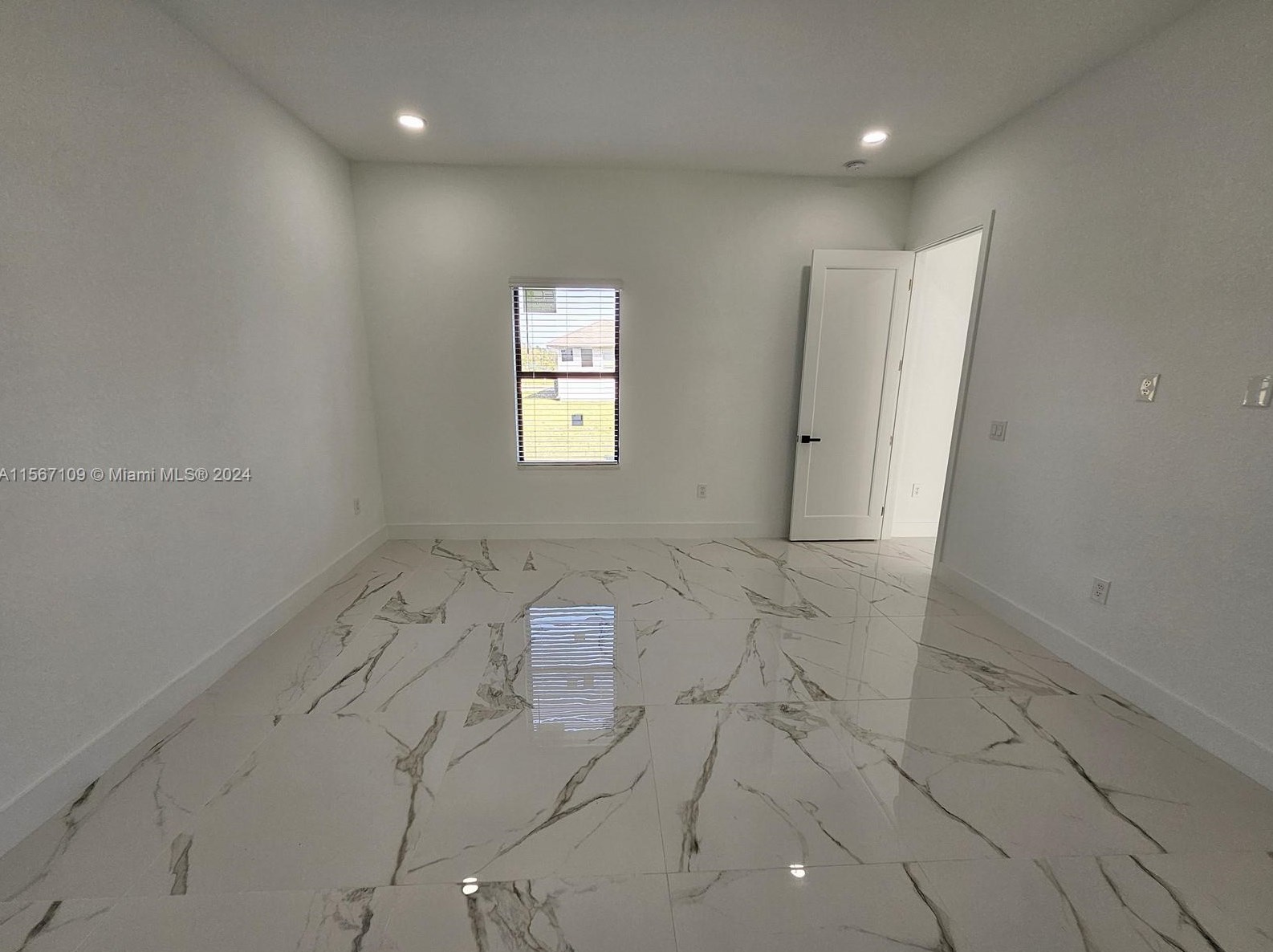 651 Keller St, Lehigh Acres FL 33974-7560 exterior