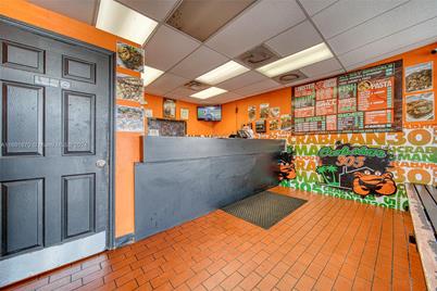 Take Out Restaurant With Walk Style Kitchen in Opa, Opa Locka, FL 33054 - Photo 1