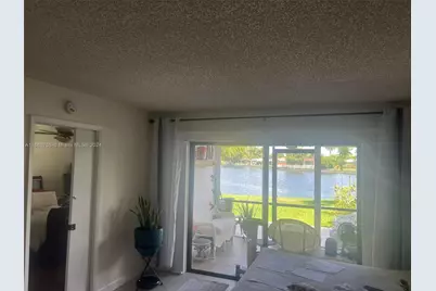 9656 W McNab Rd #105, Tamarac, FL 33321 - Photo 8