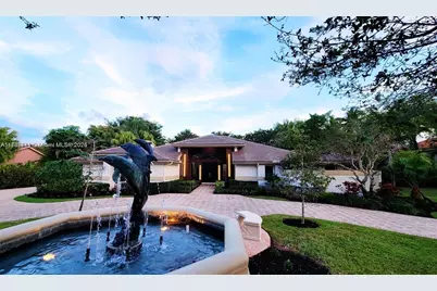 7700 S Woodridge Dr, Parkland, FL 33067 - Photo 1