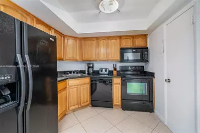 100 Golden Isles Dr #104, Hallandale Beach, FL 33009 - Photo 12