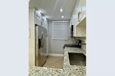 8437 Forest Hills Drive #103, Coral Springs, FL 33065 - Photo 4