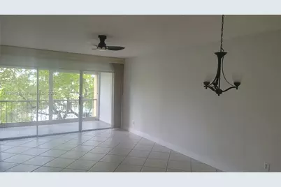 6091 NW 61 Avenue #310, Tamarac, FL 33319 - Photo 1