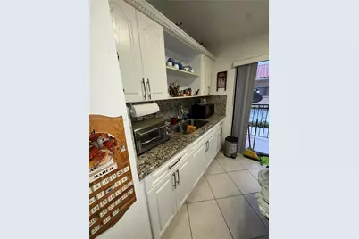 7795 W 29th Way #201, Hialeah, FL 33018 - Photo 6