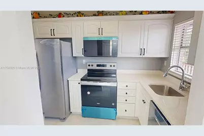 9900 Sunrise Lakes Blvd #309, Sunrise, FL 33322 - Photo 1