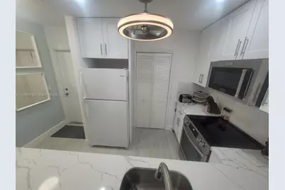 300 Golden Isles Dr #217, Hallandale Beach, FL 33009 - Photo 1