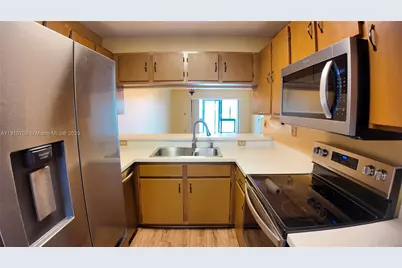 9577 W McNab Rd #110, Tamarac, FL 33321 - Photo 8