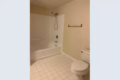 5840 W Sample Rd #306, Coral Springs, FL 33067 - Photo 10