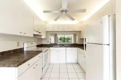 9455 N Belfort Cir #211, Tamarac, FL 33321 - Photo 1