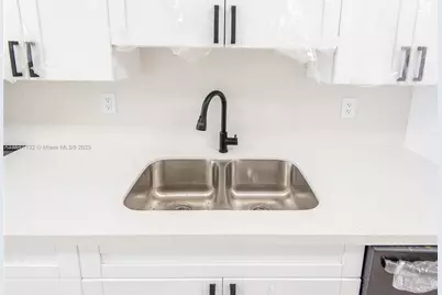 1750 NE 191st St #100-1, Miami, FL 33179 - Photo 12