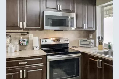 9301 Lime Bay Blvd #105, Tamarac, FL 33321 - Photo 4