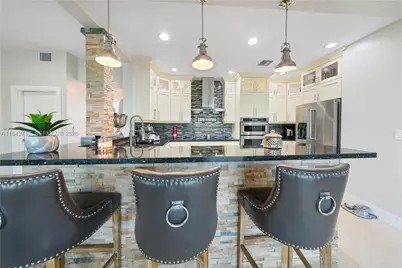 9621 W Calusa Club Dr, Miami, FL 33186 - Photo 12