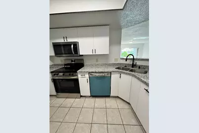 5065 Wiles Rd #103, Coconut Creek, FL 33073 - Photo 6