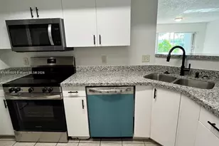 5065 Wiles Rd, Coconut Creek, FL 33073 - Photo 6