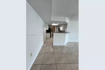 5065 Wiles Rd #103, Coconut Creek, FL 33073 - Photo 4