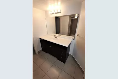 2850 N Oakland Forest Dr #107, Oakland Park, FL 33309 - Photo 10