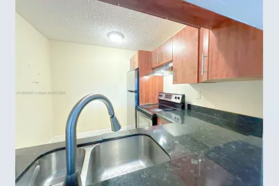 484 NW 165th St Rd #A-412, Miami, FL 33169 - Photo 2