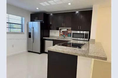 6095 N Sabal Palm Blvd #103, Tamarac, FL 33319 - Photo 2