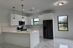 3109 9th St SW, Lehigh Acres, FL 33976 - Photo 4