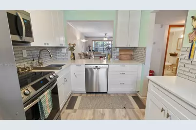 8605 W Sample Rd #202, Coral Springs, FL 33065 - Photo 2