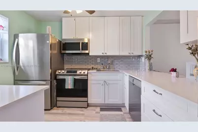 8605 W Sample Rd #202, Coral Springs, FL 33065 - Photo 1