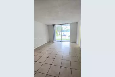 498 NW 165th St Rd #D-101, Miami, FL 33169 - Photo 1