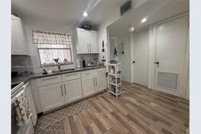9581 Sunrise Lakes Blvd #101, Sunrise, FL 33322 - Photo 2