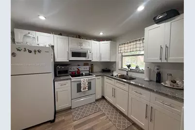 9581 Sunrise Lakes Blvd #101, Sunrise, FL 33322 - Photo 1