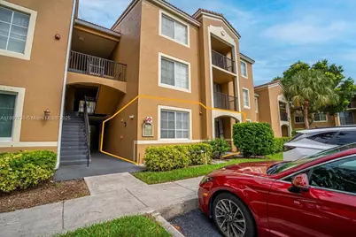 7910 N Nob Hill Rd #105, Tamarac, FL 33321 - Photo 1