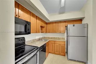 9644 S Belfort Cir, Tamarac, FL 33321 - Photo 4