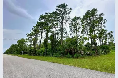 1247 Rake St E, Lehigh Acres, FL 33974 - Photo 1