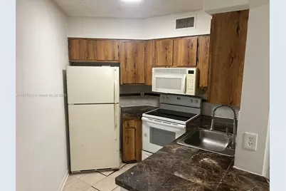 210 Lake Pointe Dr #201, Oakland Park, FL 33309 - Photo 1