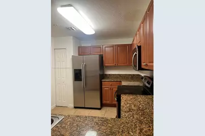 11401 NW 89th St #220, Doral, FL 33178 - Photo 12