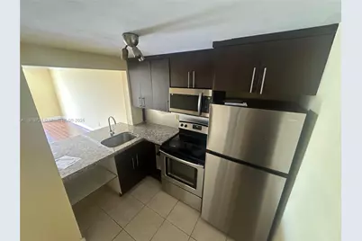 496 NW 165th St Rd #D-311, Miami, FL 33169 - Photo 4