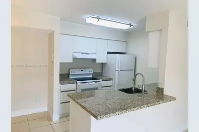 10477 NW 7th St #104, Pembroke Pines, FL 33026 - Photo 1