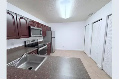 5761 Riverside Dr #303B4, Coral Springs, FL 33067 - Photo 2