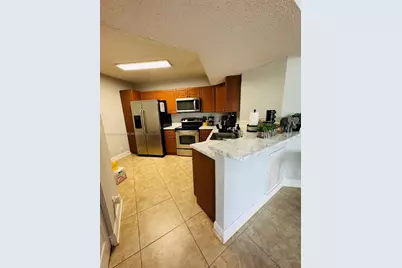 8821 Wiles Rd #305, Coral Springs, FL 33067 - Photo 16